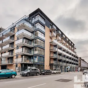 Millennium Manufaktura Yellow Apartment Warsaw